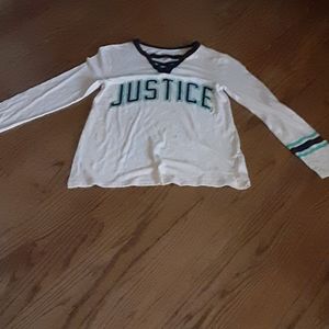A thin,long sleeve,justice shirt